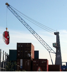 1335_A large crane holding a car.png